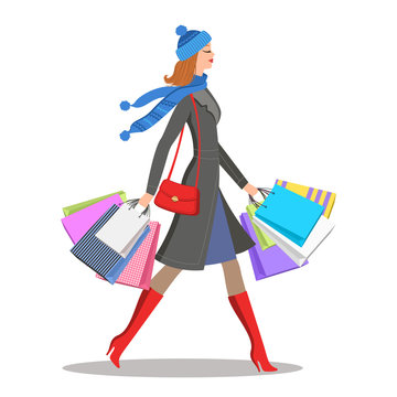 Shopper young woman. Stylish cartoon girl with colourful shopping bags. Sale and shopping concept. Vector illustration, eps 10.