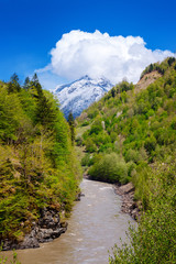 Fototapeta na wymiar Kutaisi. Rioni River. View on Svaneti mountains