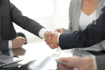 confident handshake of business partners