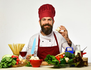 Restaurant cuisine concept. Chef prepares meal. Cook with smile