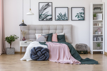 Modern bedroom with knot pillow