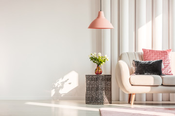 Metal table next to sofa