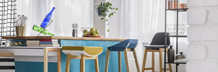 Stools and blue dining table