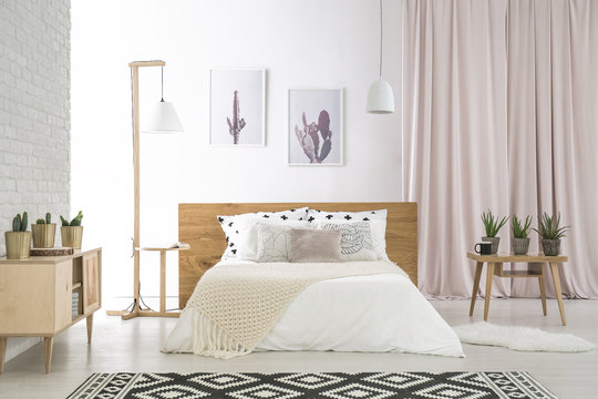 Big bed with white beddings