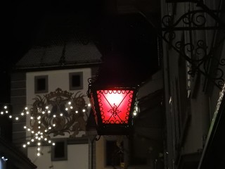 The red lantern of the hostel indicates that guests can come here to warm up and find some human warmth in the cold of winter