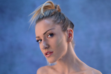 Beautiful woman blonde hair face close up portrait 