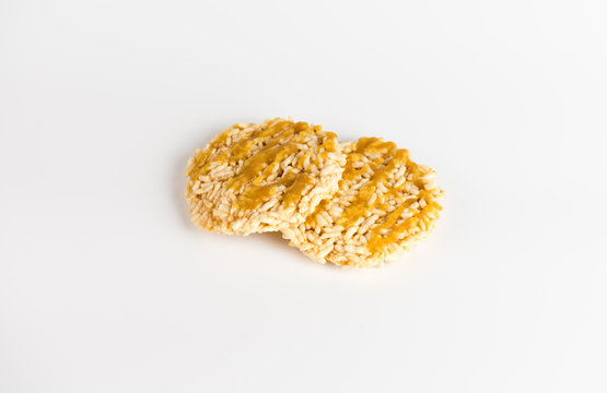 Rice cracker with sugar on white background