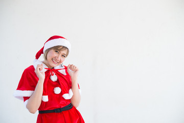 Beautiful young asian woman in Santa Claus clothes on white background,Thailand people,Sent happiness for children,Merry christmas,Welcome to winter,Happy woman concept