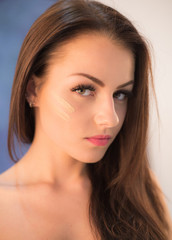 Fototapeta premium Attractive young woman portrait in studio