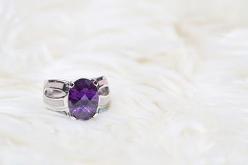 purple gemstone on silver ring