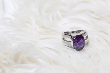 purple gemstone on silver ring