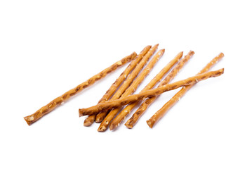 Salty cracker pretzel sticks isolated on white background