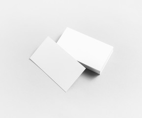 Photo of blank business cards on paper background. For design portfolios.