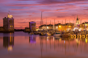 Fototapeta na wymiar La Rochelle - Harbor by night with beautiful sunset
