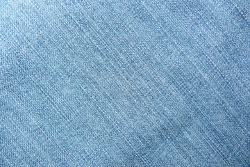 Naklejka na ściany i meble blue denim fabric close-up for design background backdrop blue blue threads jeans textile cloth for clothing style