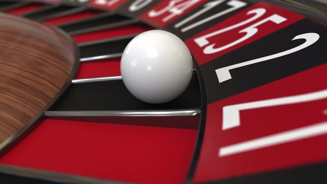 Casino roulette wheel ball hits 2 two black