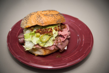 Roast Beef Sandwich on a Red Plate