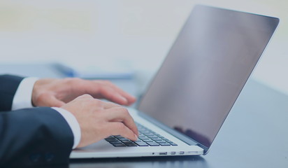 Person Typing on a modern laptop
