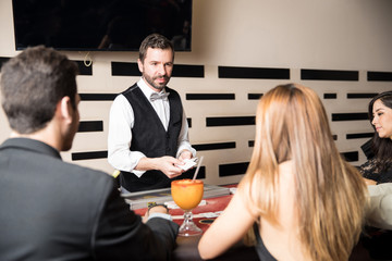 Casino dealer in a blackjack table