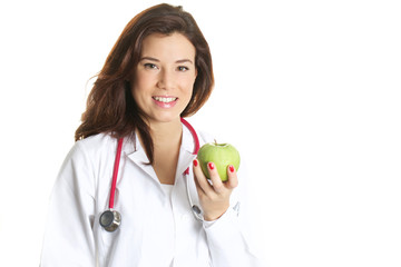 young nutritionist holding a green apple
