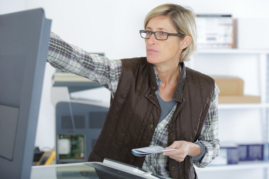female working with a printer