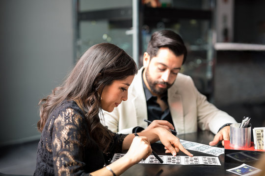 Couple Playing Casino Lottery