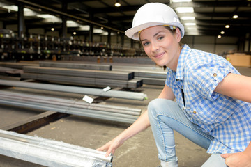 Woman in large industrial unit