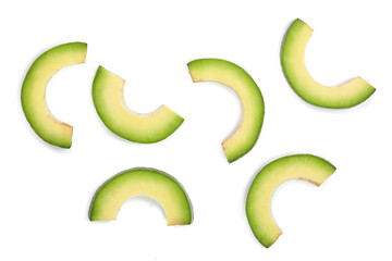 avocado slices isolated on white background. Top view. Flat lay pattern
