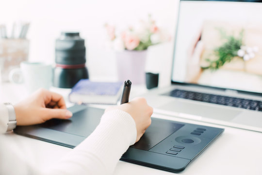 retouching on computer laptop