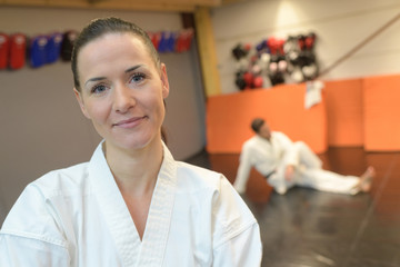 confident female in a gym in martial arts training