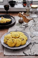 Yellow pumpkin cookies, with coconut and slices of chocolate