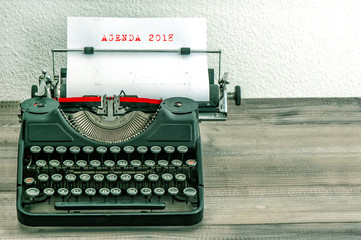 Fototapeta na wymiar Typewriter white paper Business concept AGENDA 2018