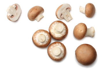 Fresh champignon mushrooms isolated on white background. top view