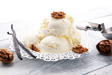 homemade oatmeal and walnut ice cream on wooden background