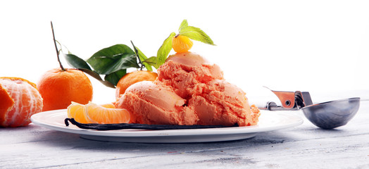 Winter Ice cream with tangerines, on wooden backgroundwith fresh mandarin