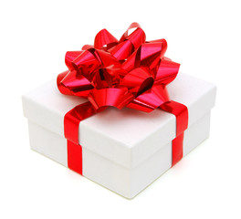 Gift box with ribbon end bow isolated on the white background, clipping path included.