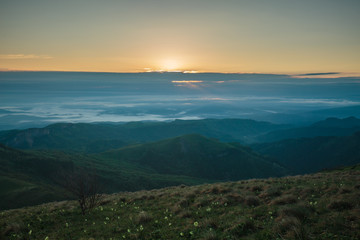 Obraz premium The formation and movement of clouds over the summer slopes of Adygea Bolshoy Thach and the Caucasus Mountains