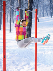 Fitness woman on the snow