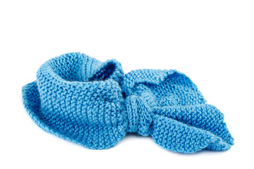 Blue knitted scarf isolated on white background