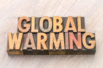 global warming word abstract in wood type