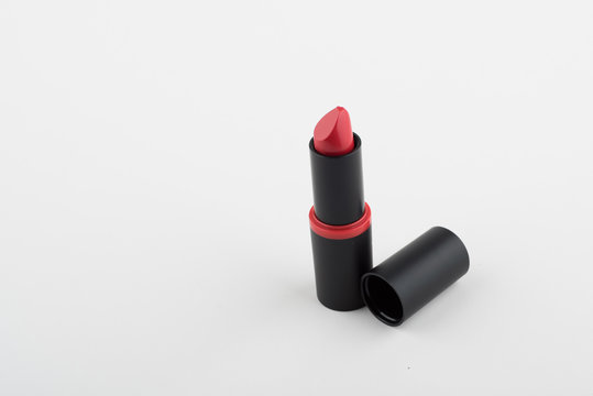 Red lipstick isolated on white background