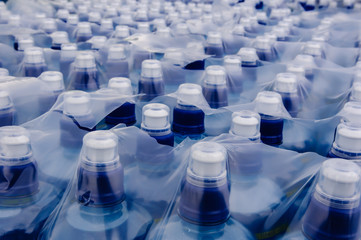 Bottles of water in plastic outer wrapper