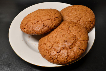 Oatmeal Cookies On Plate Close Up Isolated On Black Background