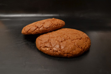 Oatmeal Cookies On Plate Close Up Isolated On Black Background