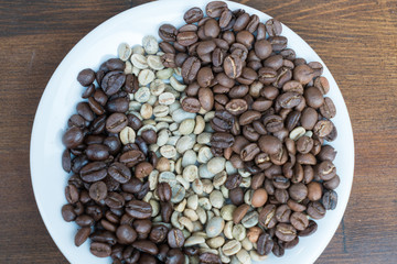 Three Types Of Roasted and Unroasted Coffee Beans On Plate