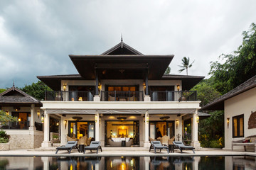 Swimming pool with sea view in luxury villa interior