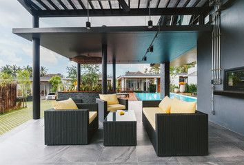 Tropical summer luxury villa interior outdoor. Palm trees, sunny day