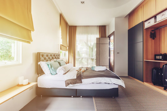 Modern bed room interior in Luxury villa. Big window