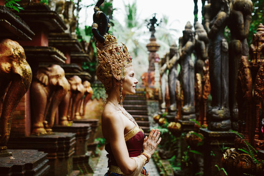 Beautiful White Woman In Thai Traditional Costume. Asian Queen Portrait Outdoor