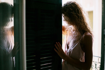 Portrait of young pretty elegant  woman in red dress